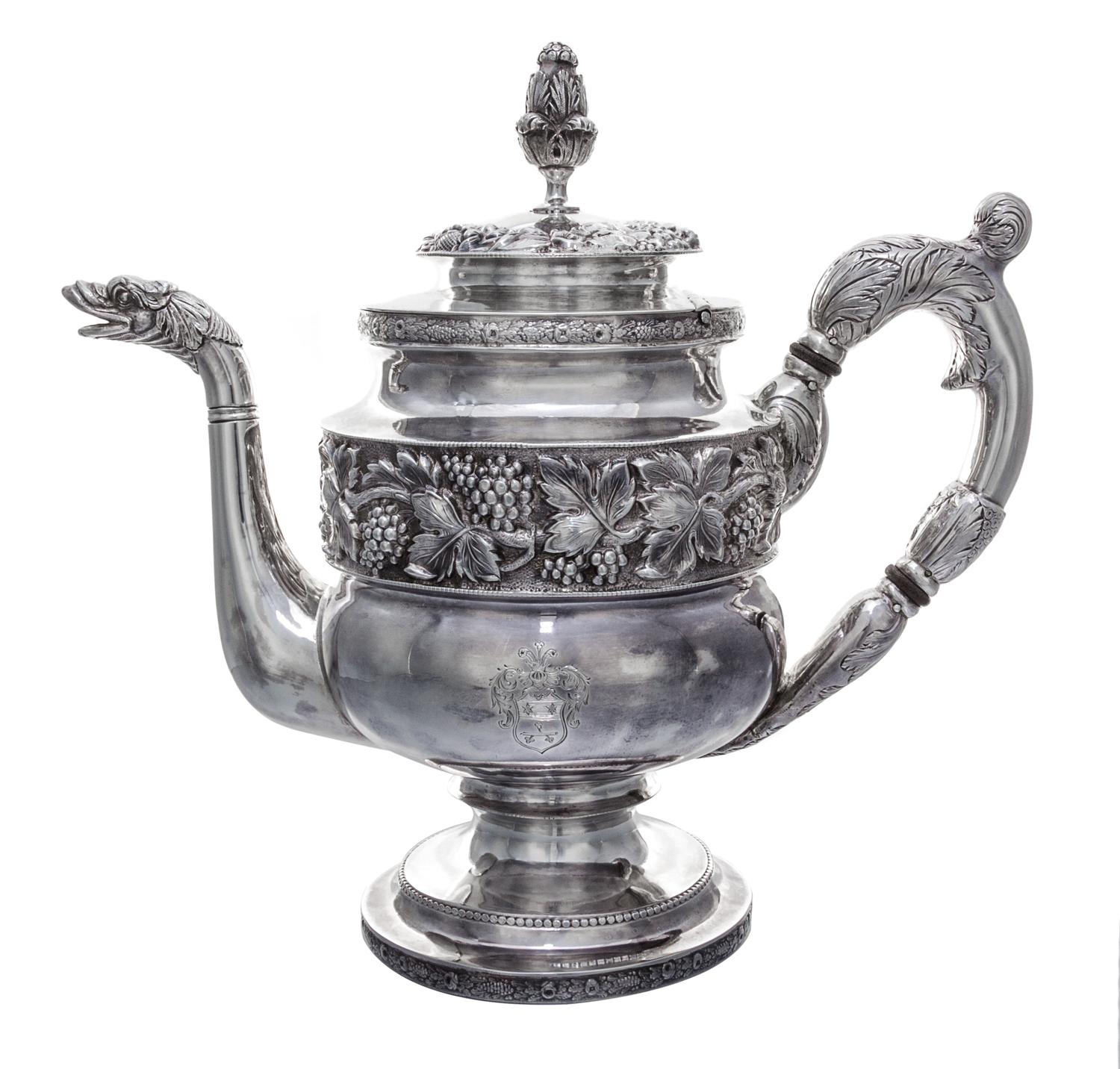 An American Silver Teapot, S. Kirk & Son, Baltimore, MD, 19th Century, having a foliate finial, the lid and body decorated with foliate