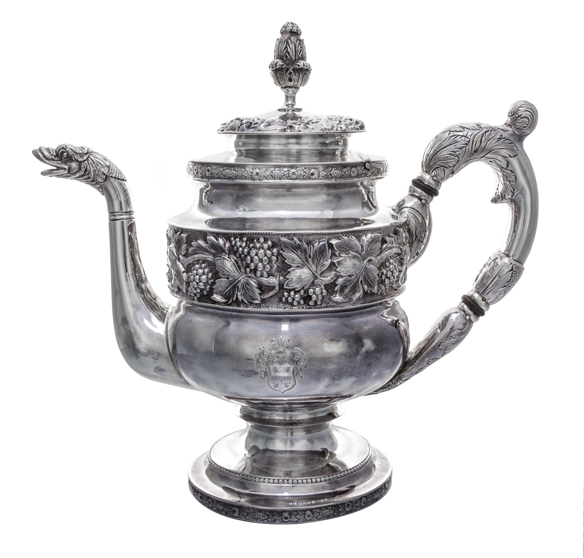 An American Silver Teapot, S. Kirk & Son, Baltimore, MD, 19th Century, having a foliate finial, the lid and body decorated with foliate