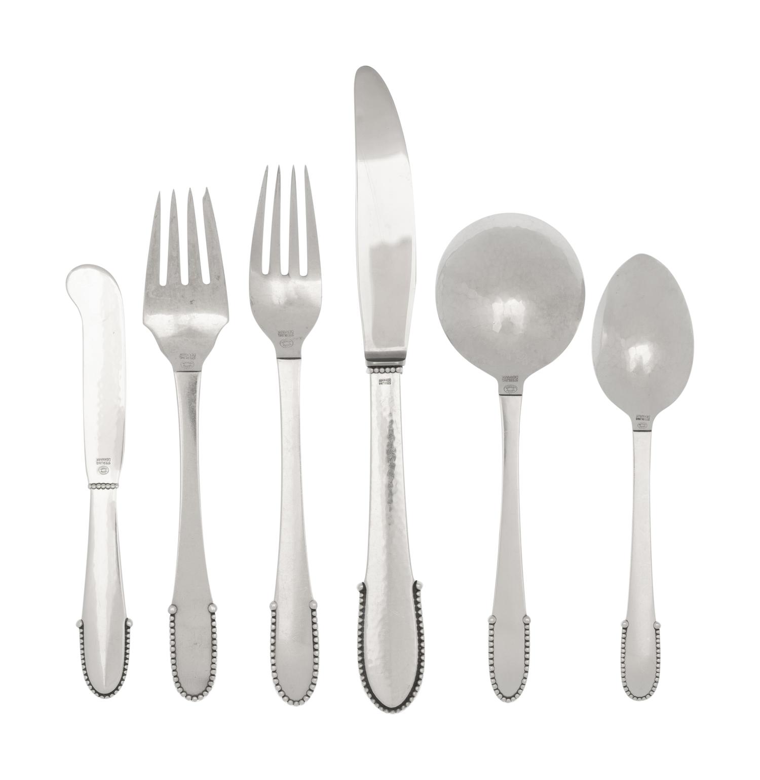 A Georg Jensen Beaded Silver Flatware Service