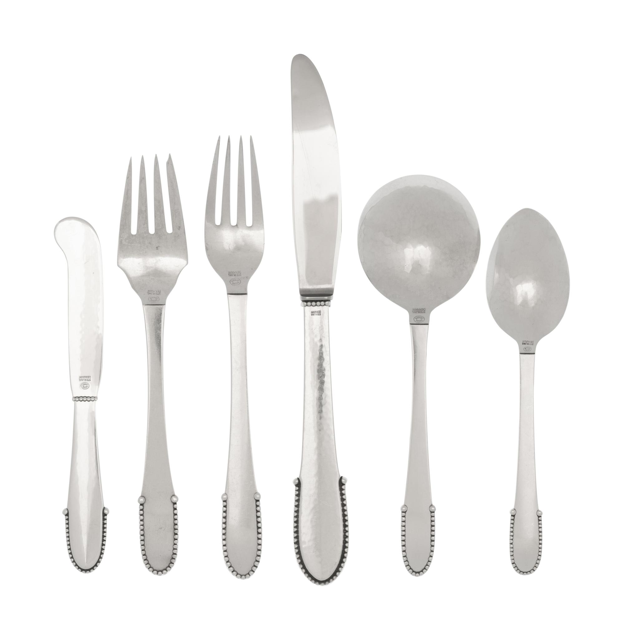 A Georg Jensen Beaded Silver Flatware Service