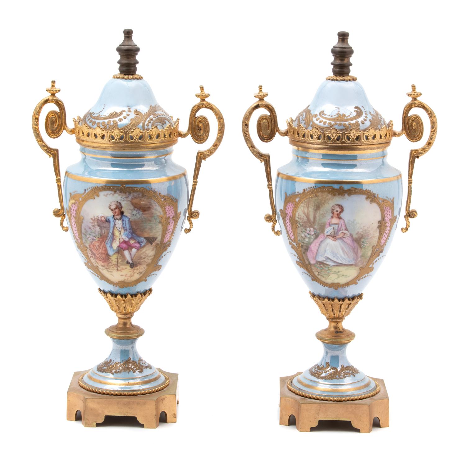 A Pair of Sevres Style Gilt Bronze Mounted Porcelain Urns — 19TH CENTURY