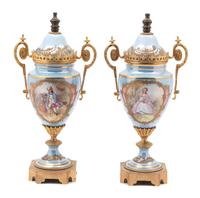 A Pair of Sevres Style Gilt Bronze Mounted Porcelain Urns — 19TH CENTURY