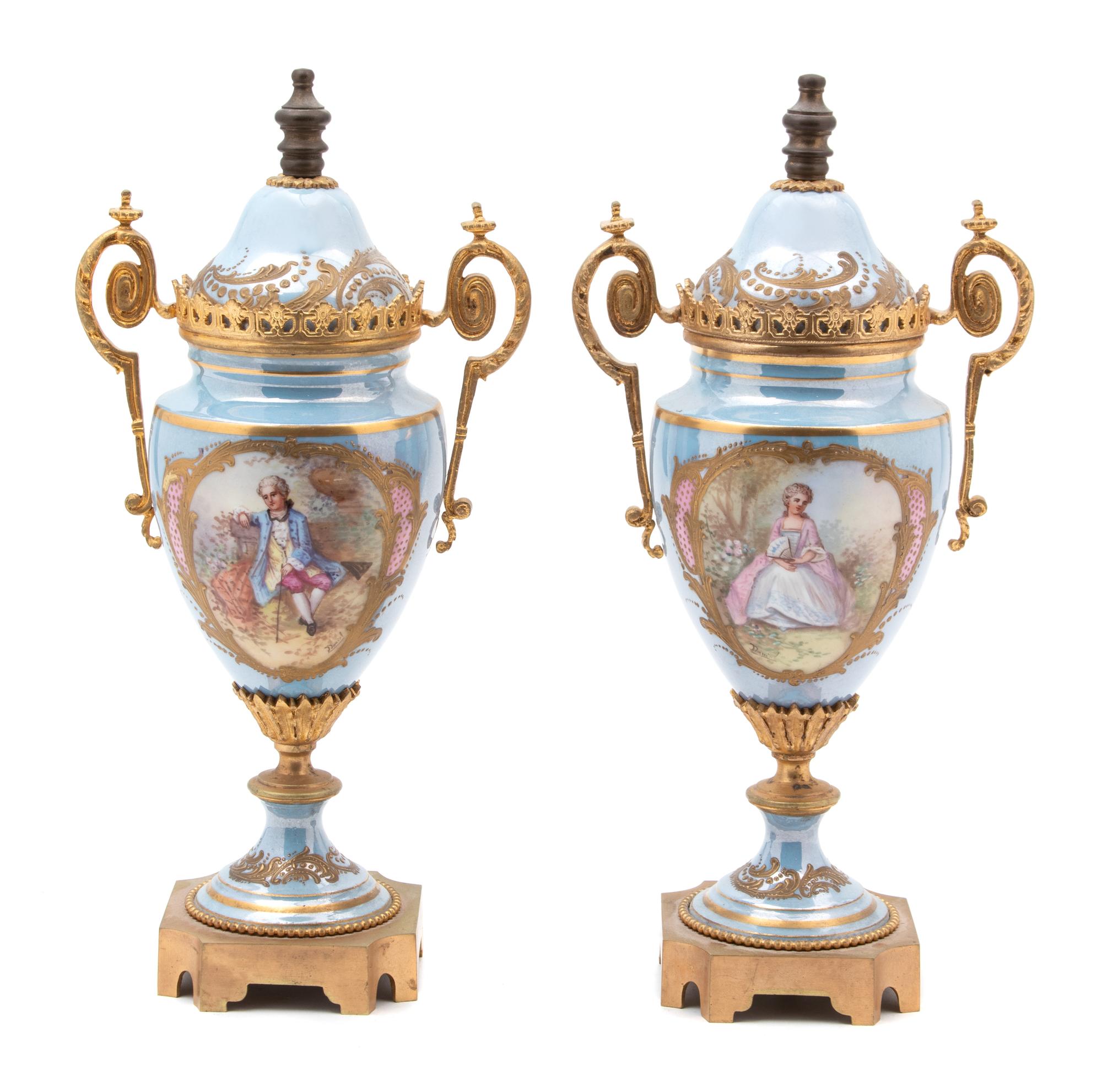 A Pair of Sevres Style Gilt Bronze Mounted Porcelain Urns — 19TH CENTURY