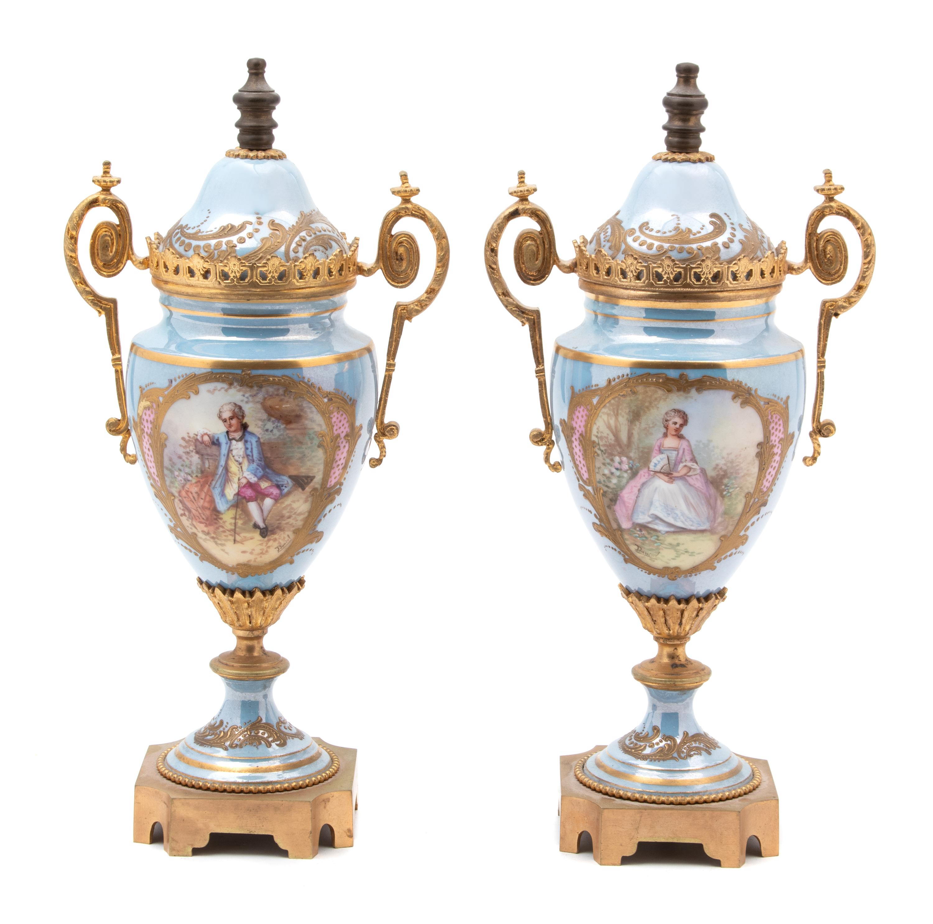A Pair of Sevres Style Gilt Bronze Mounted Porcelain Urns — 19TH CENTURY