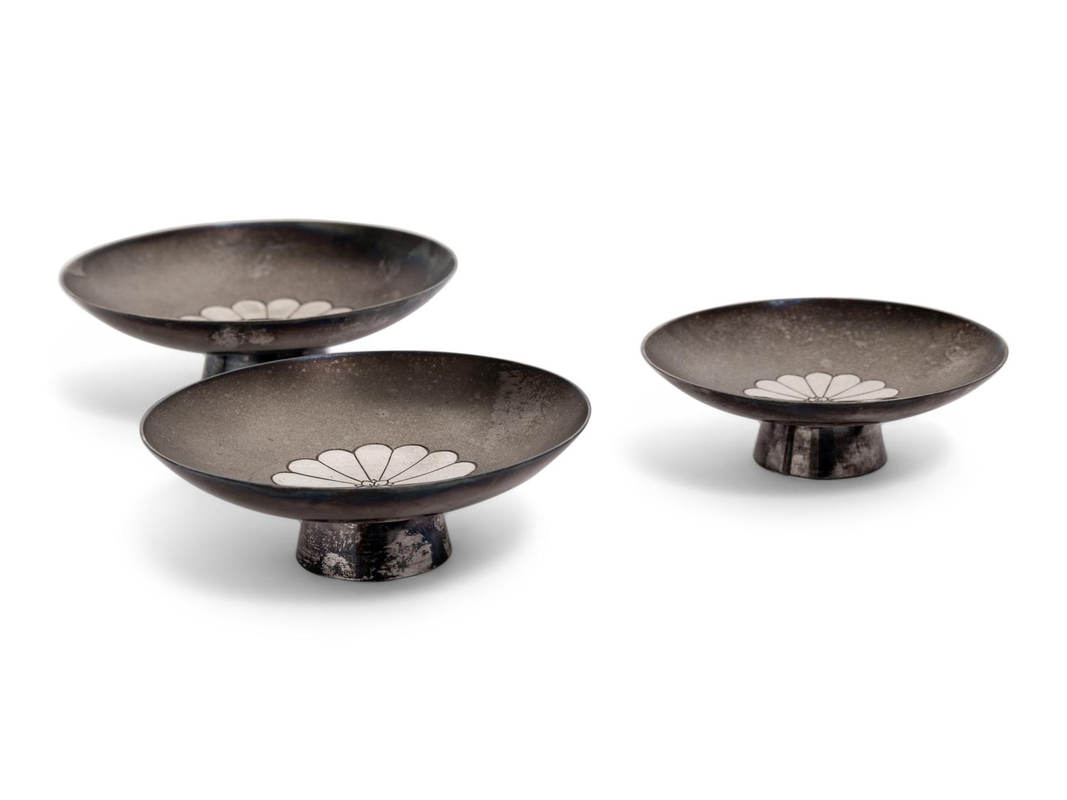 A Set of Three Japanese Silver Sake Cups