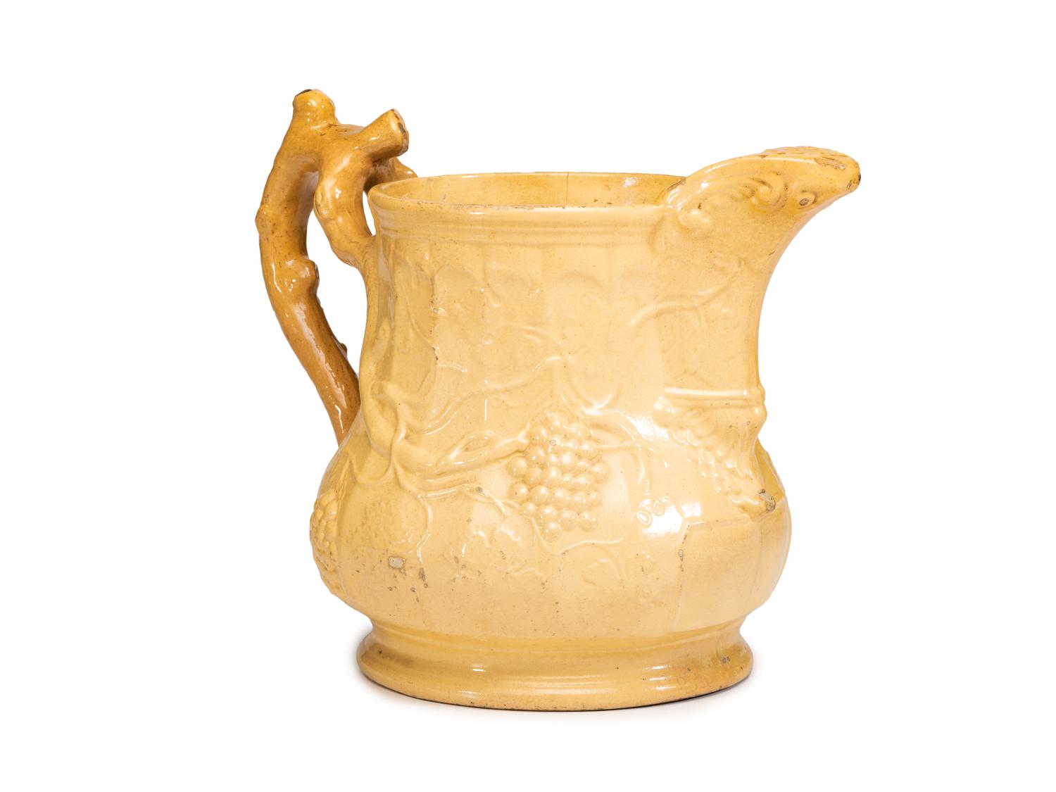 A Large Swan Hill Pottery Molded Yellowware Ice Water Pitcher