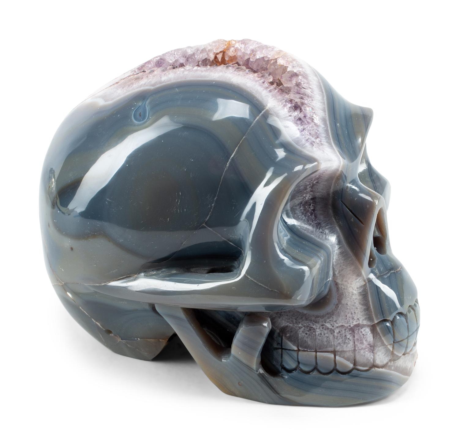 A Continental Carved Agate Geode Skull
