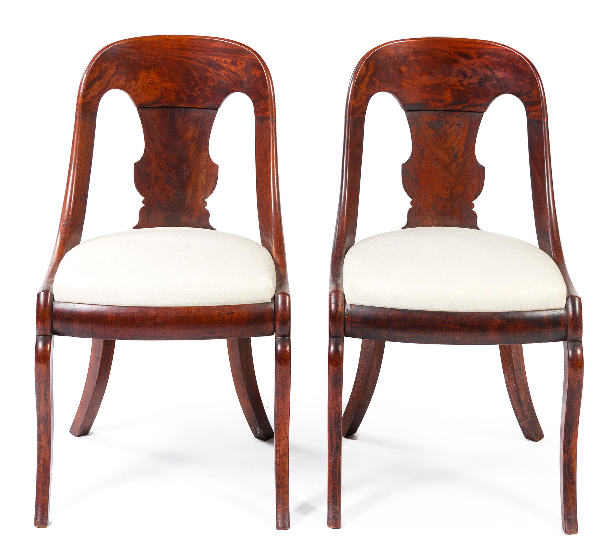 A Pair of American Empire Mahogany Slipper Chairs Height 32 1/2 inches. — 19TH CENTURY