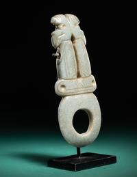 A Costa Rican Green Jade Double Avian Pendant