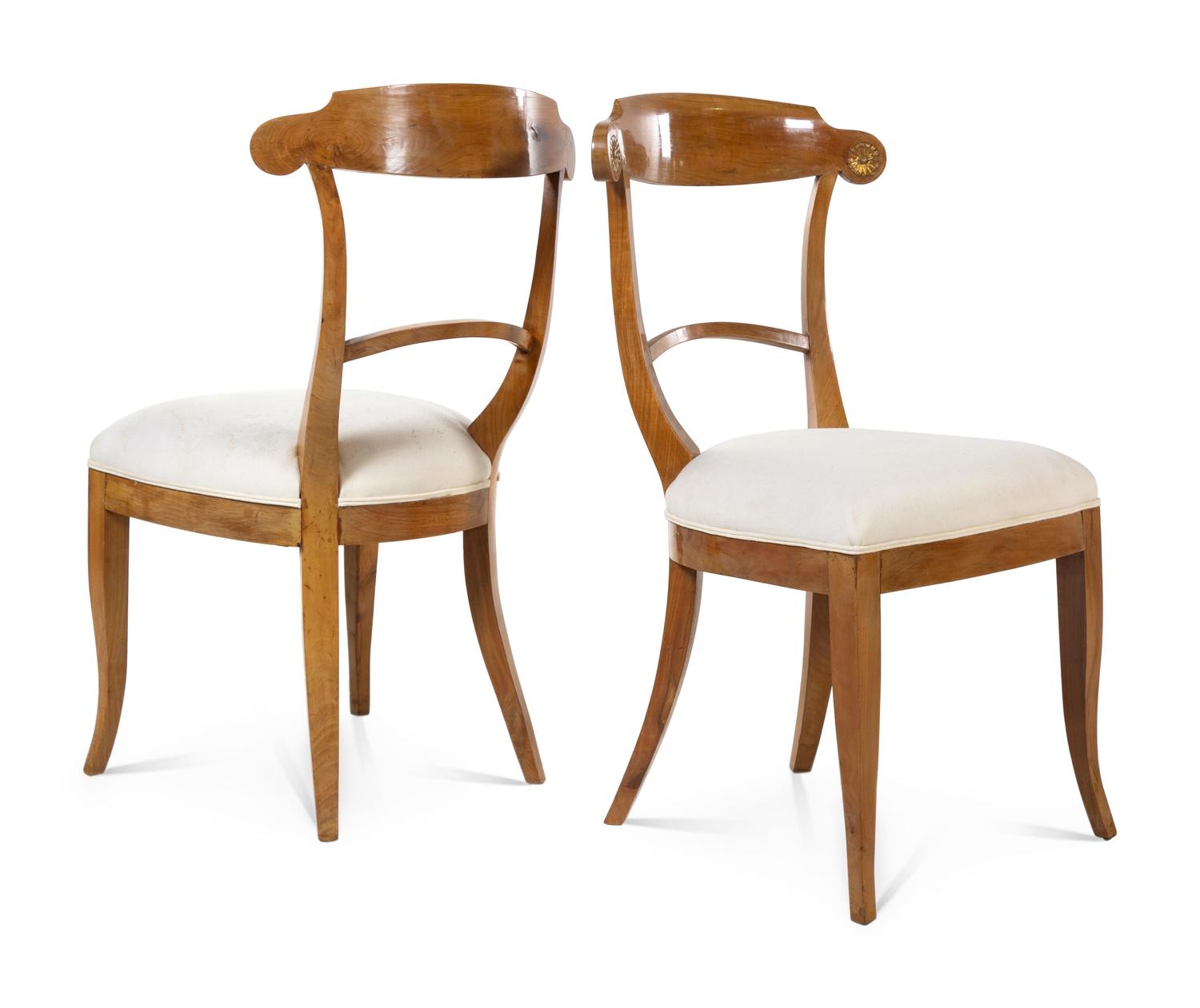 A Set of Four Biedermeier Fruitwood Dining Chairs