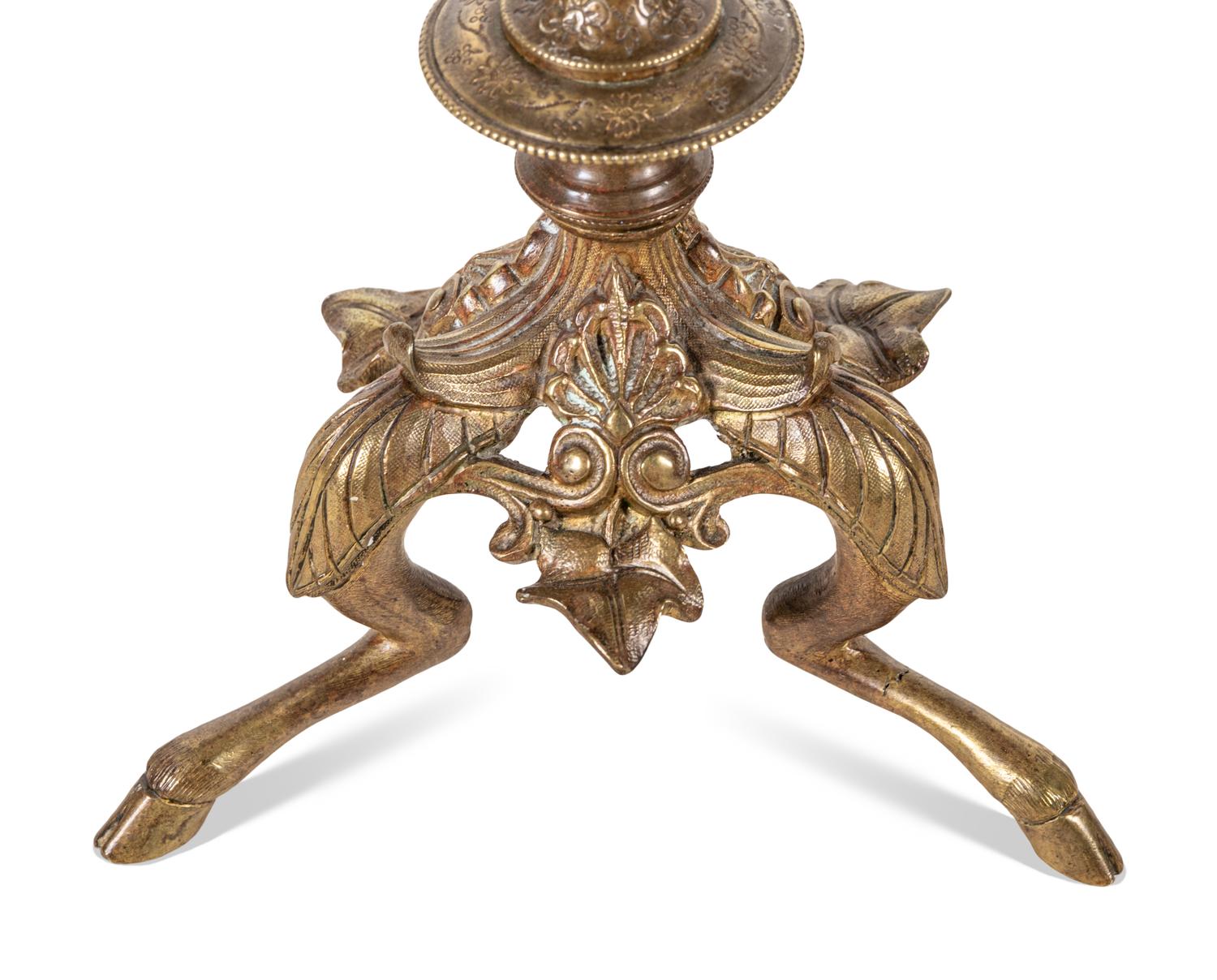 A Pair of Continental Gilt Bronze Six-Light Candelabra
