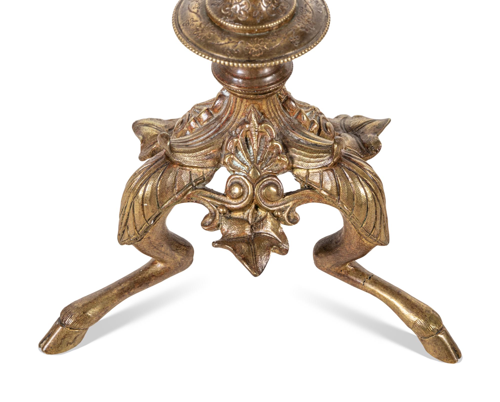 A Pair of Continental Gilt Bronze Six-Light Candelabra