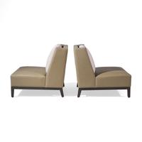 A Pair of Christian Liaigre Low Chairs