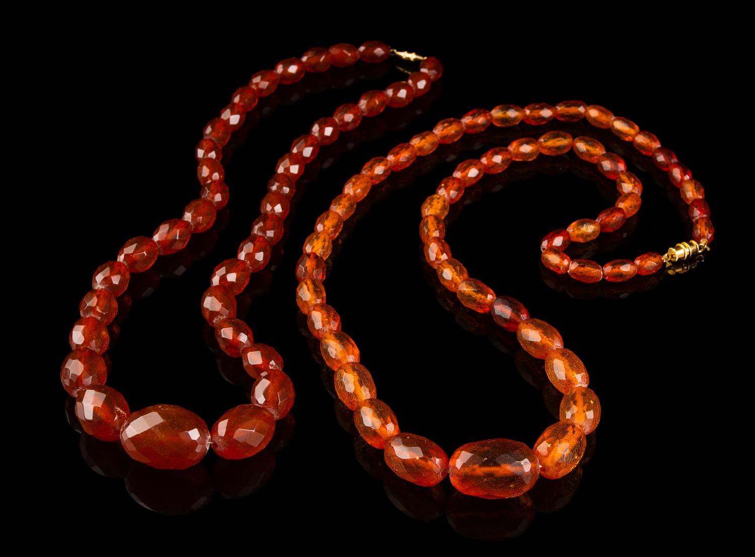 Two Chinese Amber Beaded Necklaces