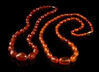 Two Chinese Amber Beaded Necklaces
