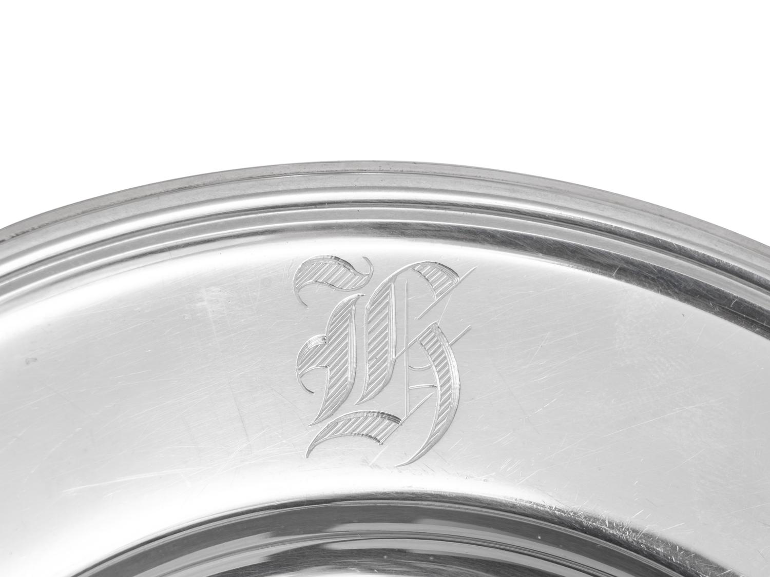 A Set of Eleven American Silver Bread Plates