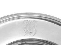 A Set of Eleven American Silver Bread Plates
