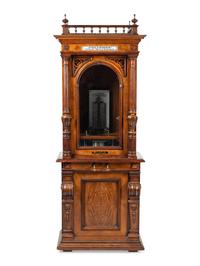 A Polyphon Mikado 24 1/2 Inch Upright Disk Music Box