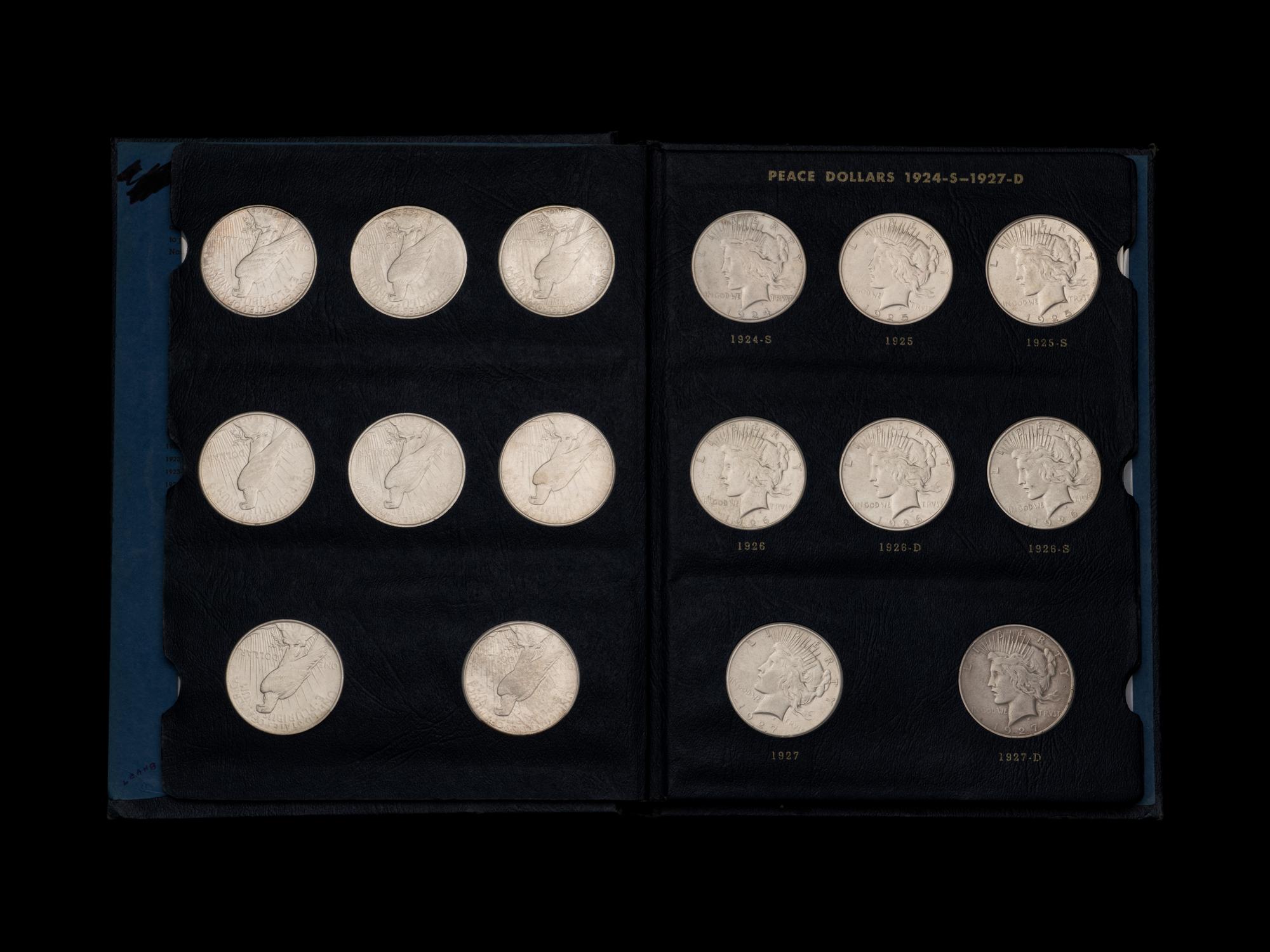 Two Sets of Peace $1 Coins