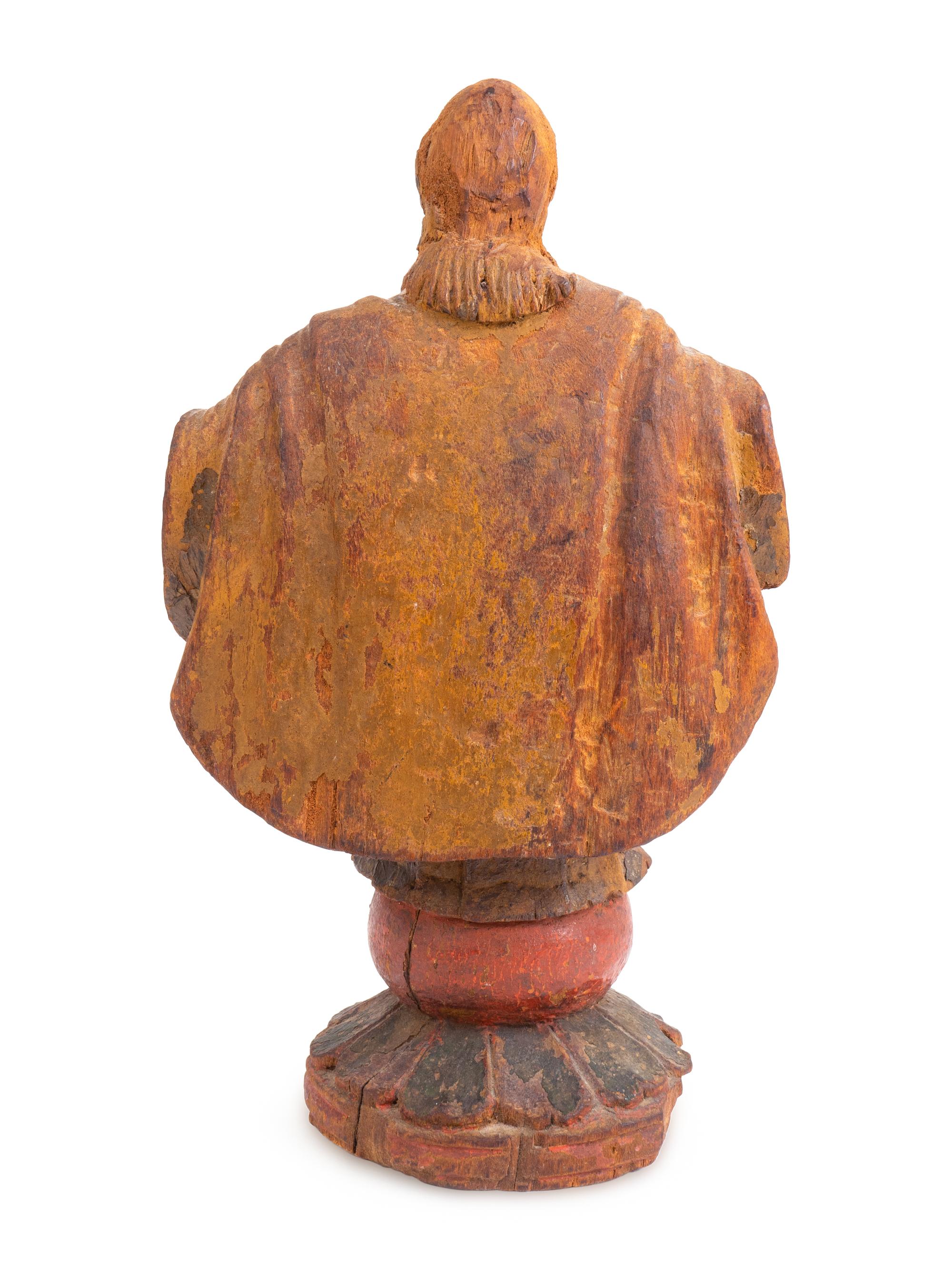 A Spanish Colonial Carved and Painted Figure of a Saint — 19TH CENTURY