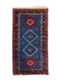 A Persian Wool Runner — 20TH CENTURY