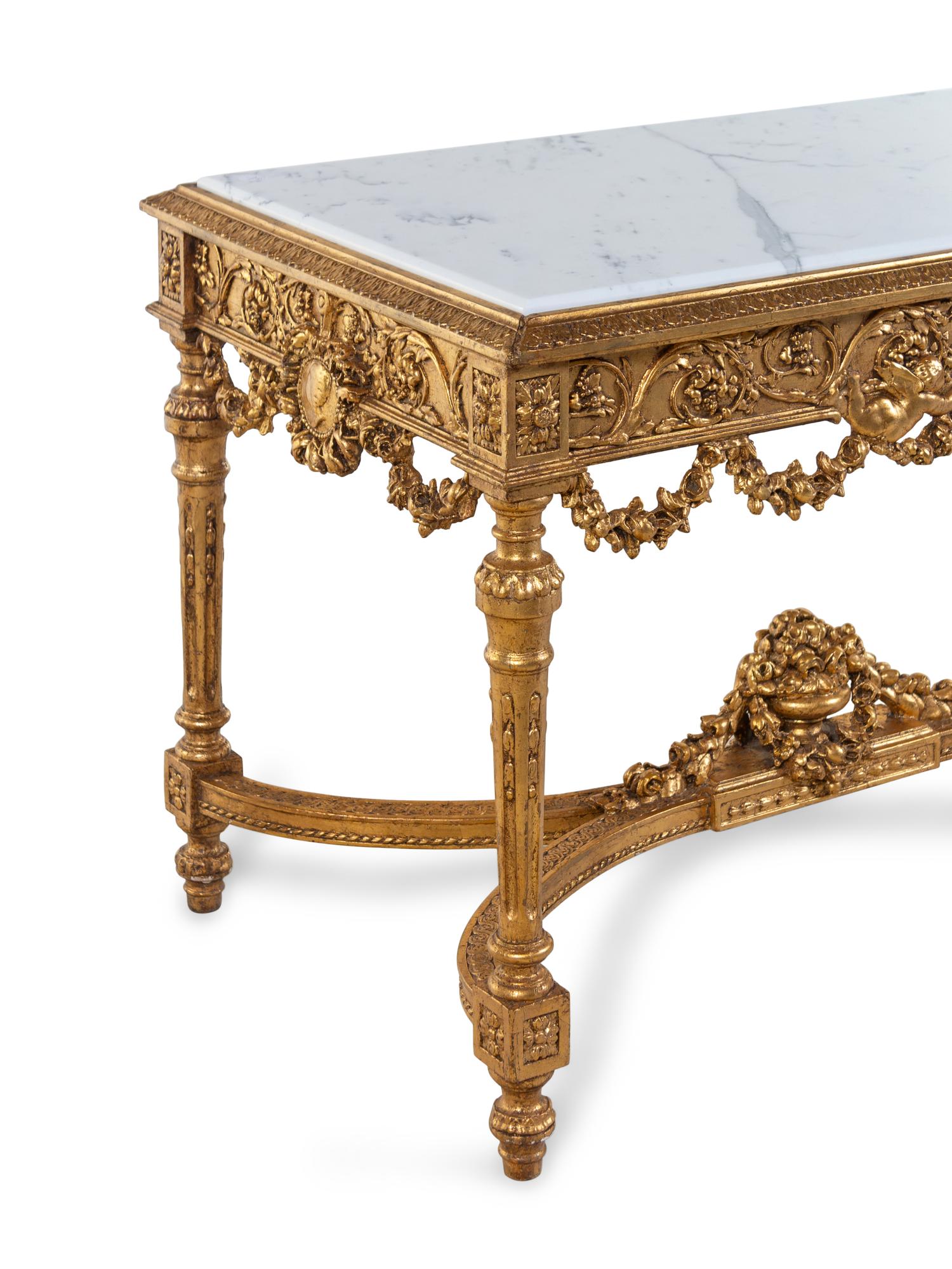 A Louis XVI Style Carved Giltwood Marble-Top Center Table