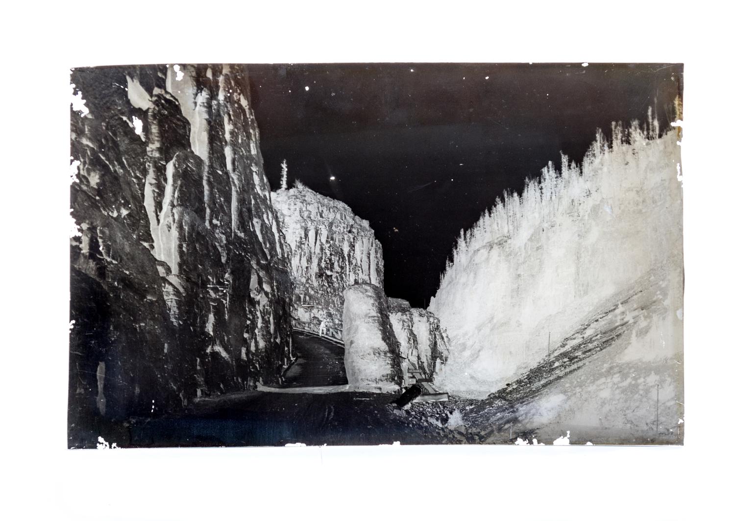 (CHICAGO), PHOTOGRAPHY. A collection of galss plate negatives including scenes of Yellow Stone National Park. Together with camera