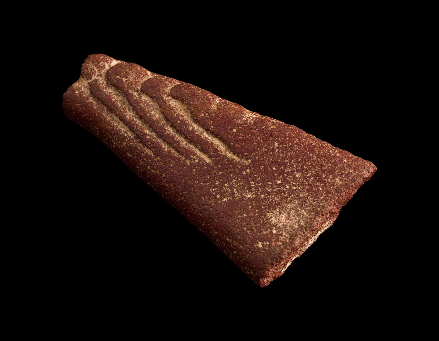 An Egyptian Red Sandstone Foot Fragment
