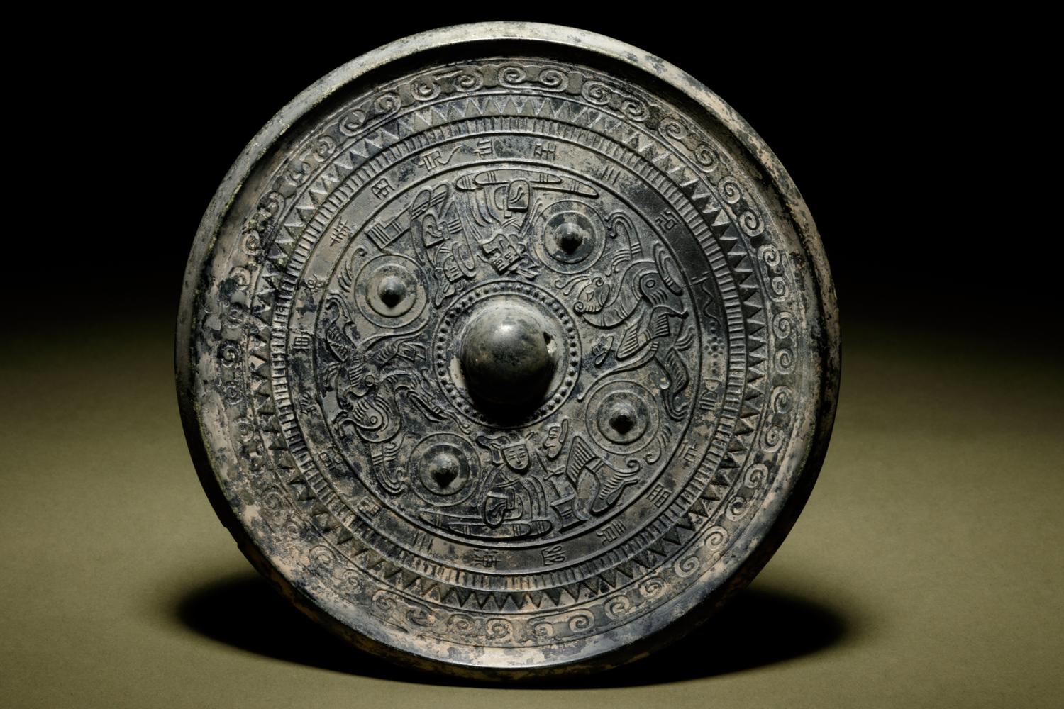 A Bronze Circular Mirror with Deities, Animals and Inscription