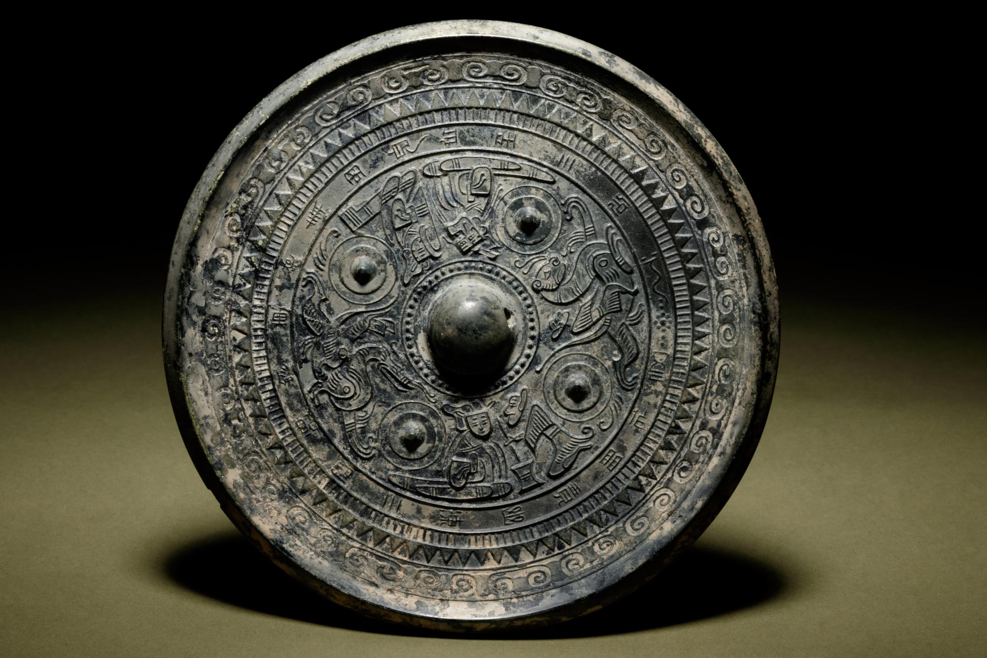 A Bronze Circular Mirror with Deities, Animals and Inscription
