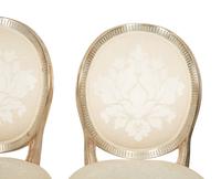 A Set of Twelve George III Style Silvered Wood Dining Chairs