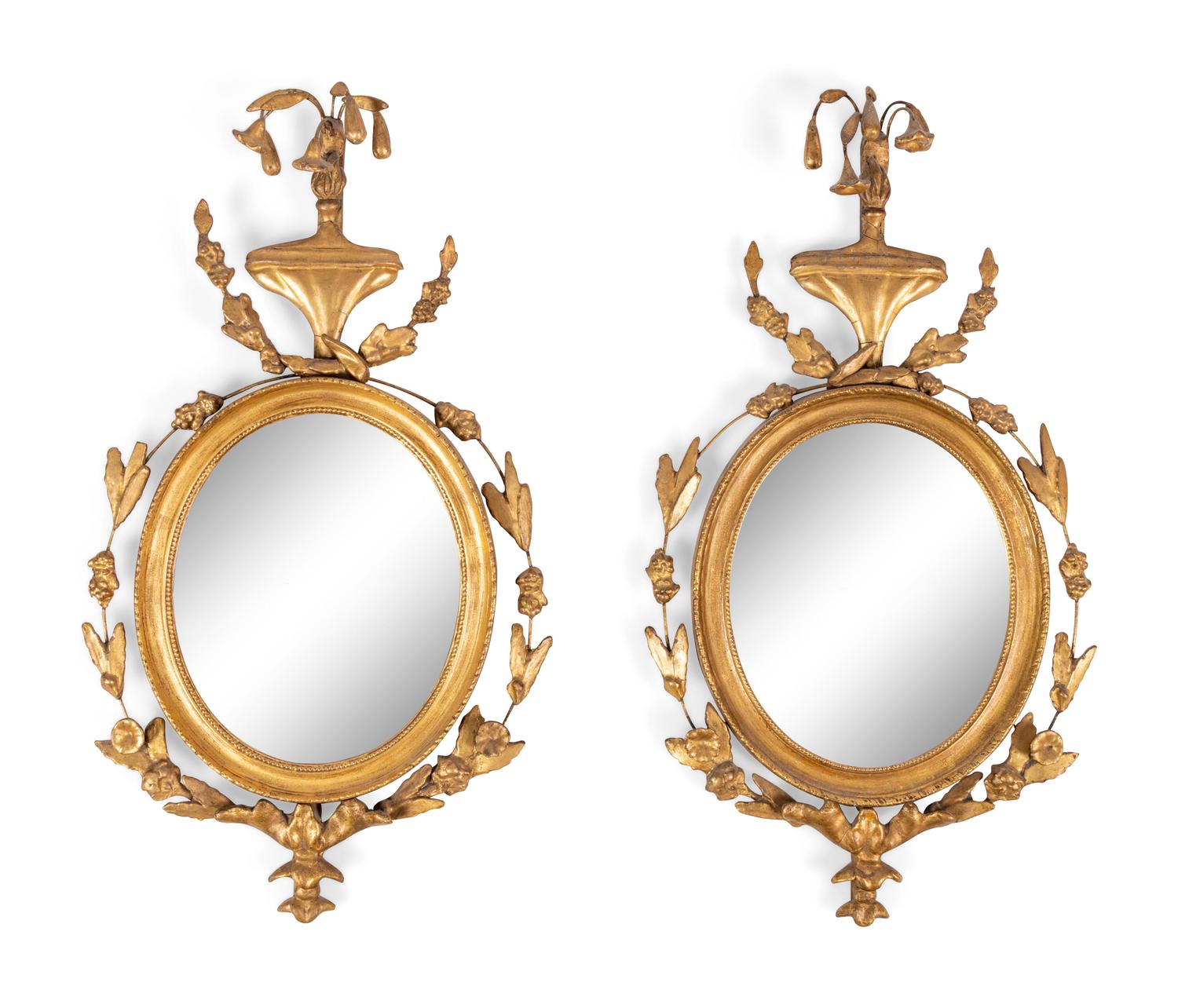 A Pair of Continental Giltwood Mirrors