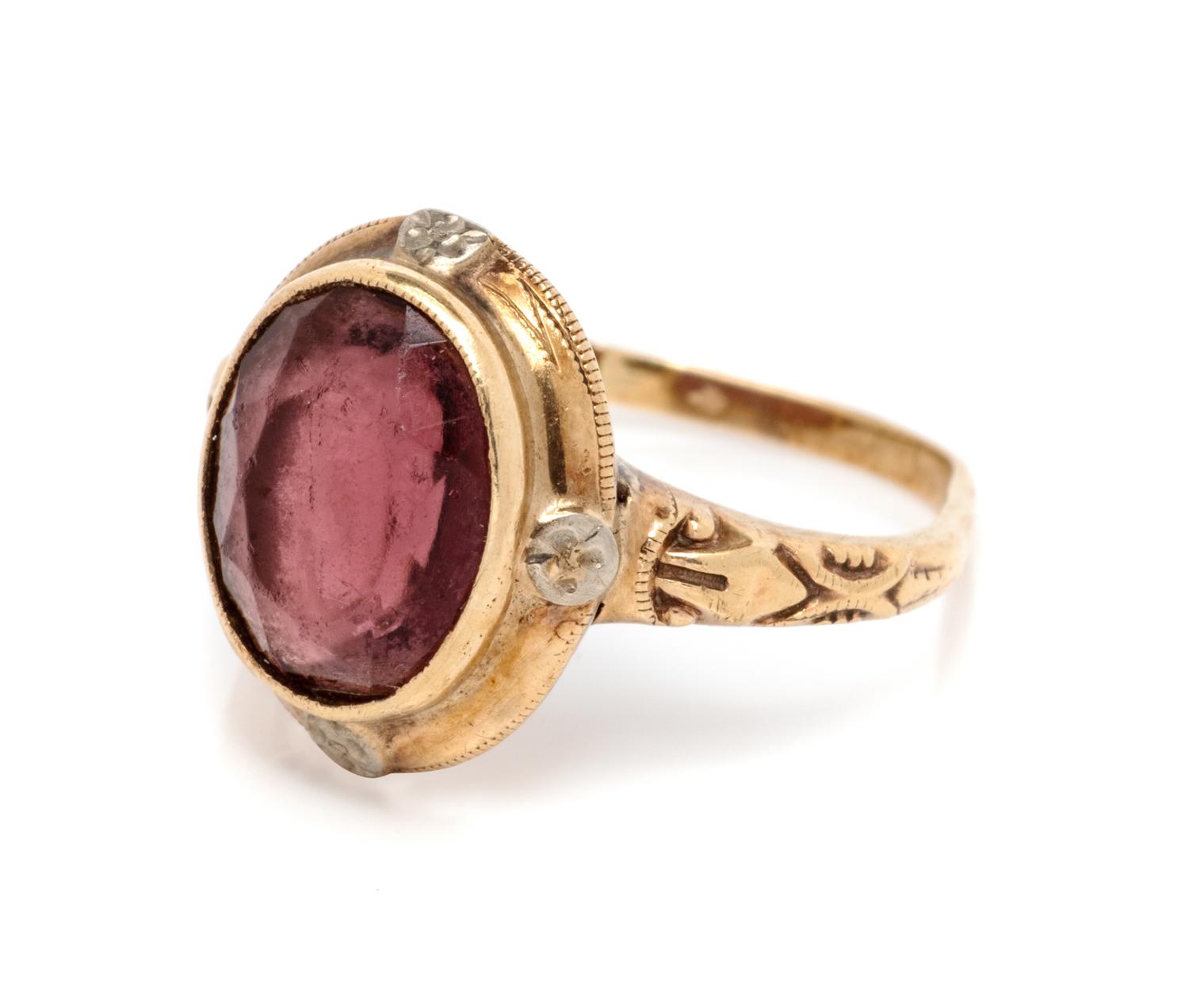 A Yellow Gold and Purple Simulant Ring,