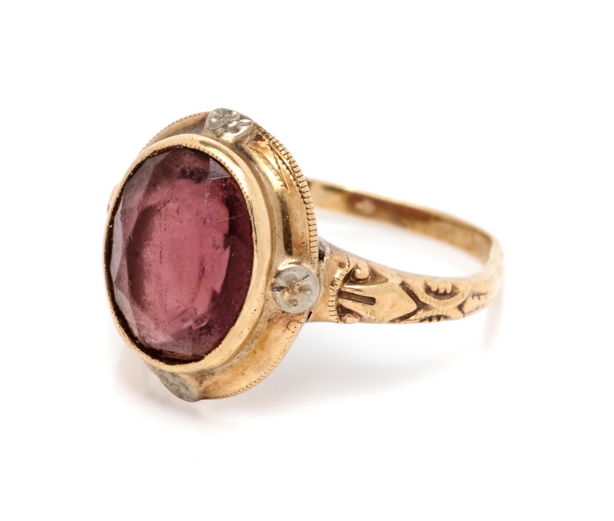 A Yellow Gold and Purple Simulant Ring,