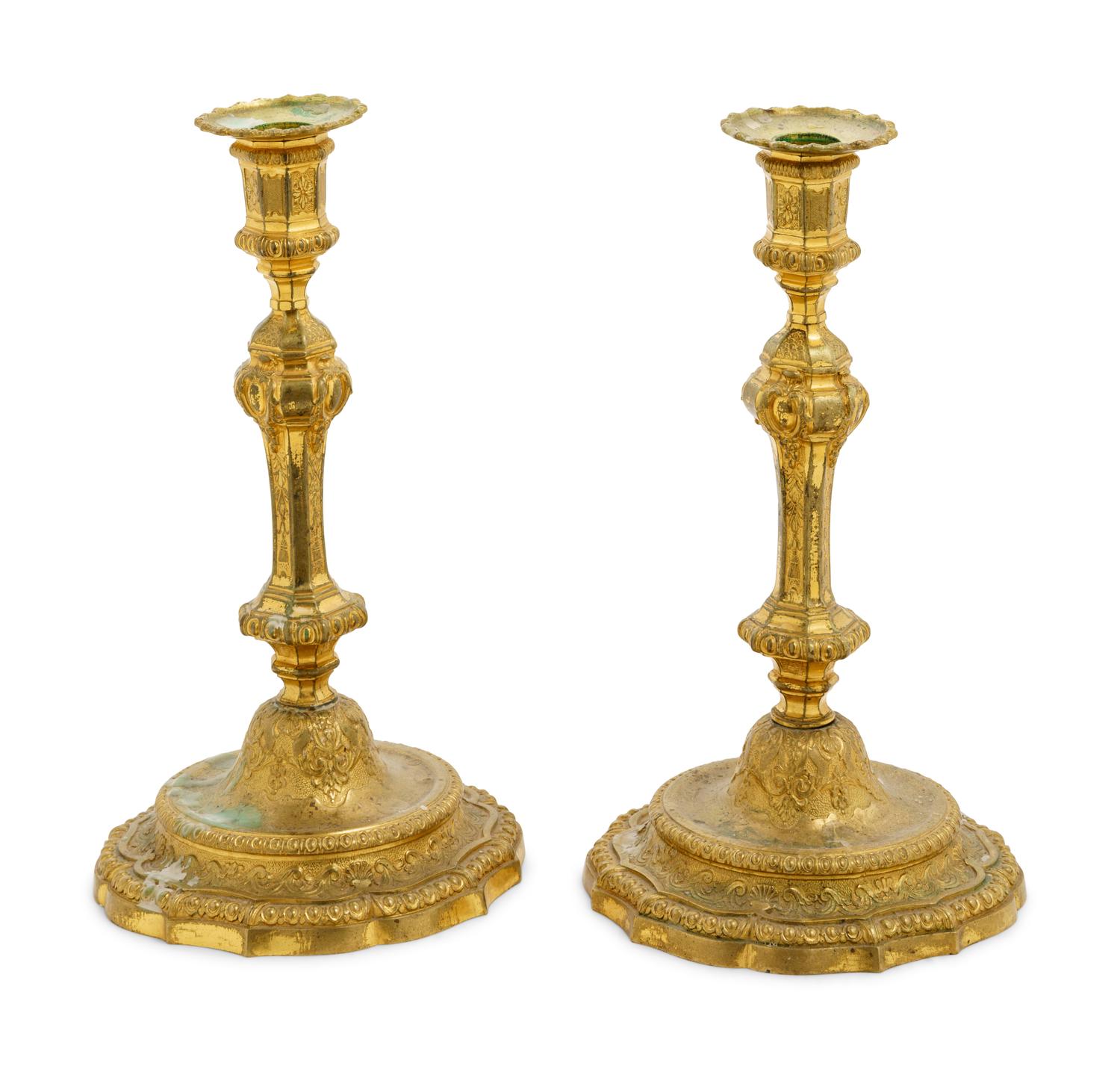 A Pair of Gilt Bronze Candlesticks