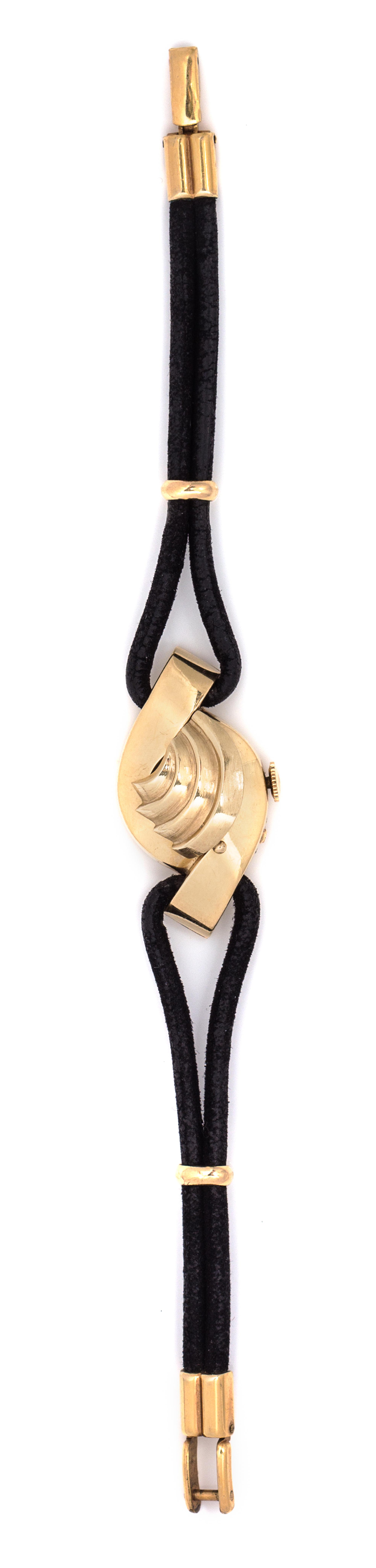 A 14 Karat Yellow Gold Surprise Wristwatch, LeCoultre, 9.90 dwts.