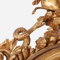 A Regency Carved Giltwood Convex Mirror Thomas Fentham & Co., circa 1810