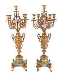 A Neoclassical Gilt Metal and Onyx Clock Garniture