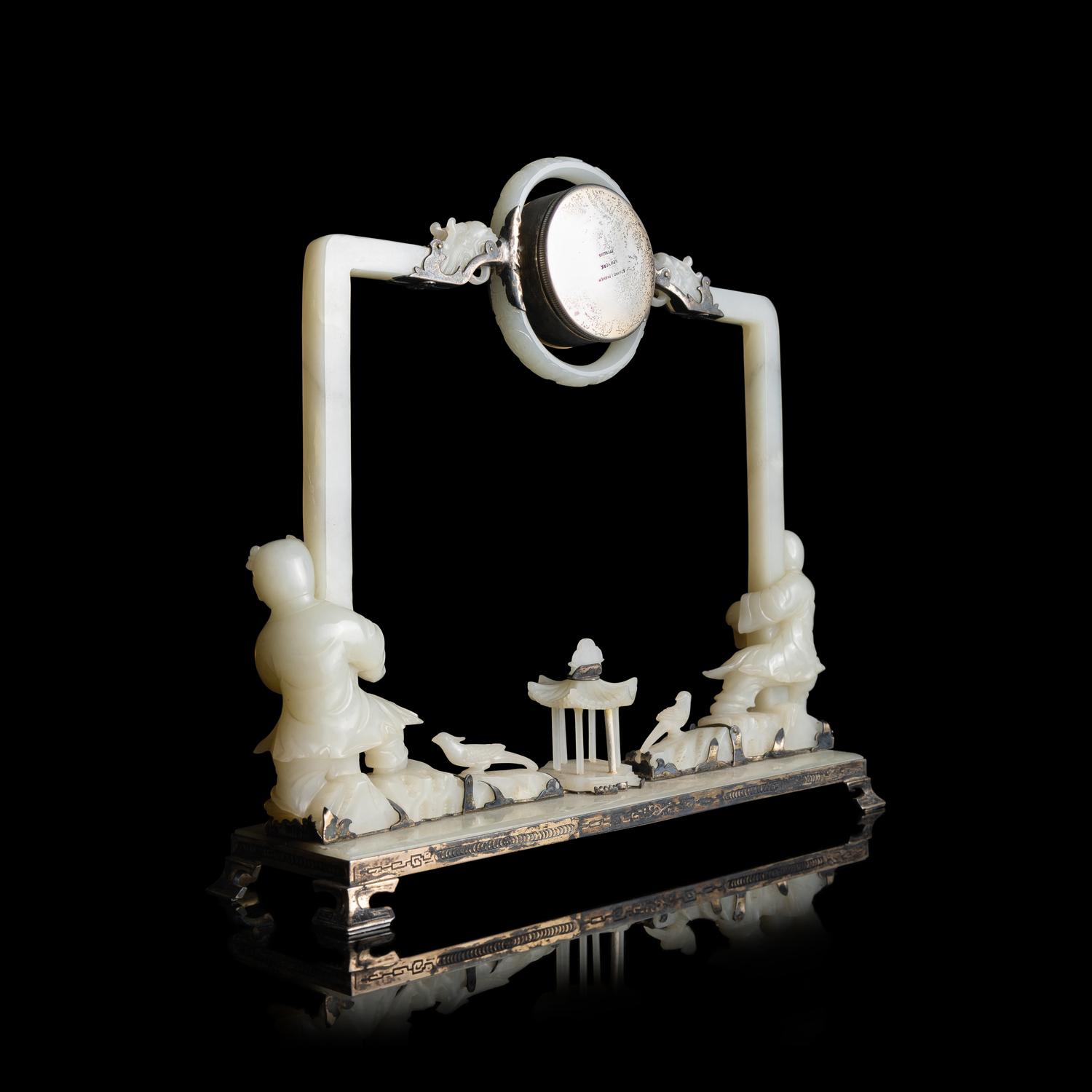An Edward I. Farmer White Jade and Silver Mounted Chinoiserie Desk Clock, Circa 1930 Edward I. Farmer約1930年製中國風白玉童子座鐘