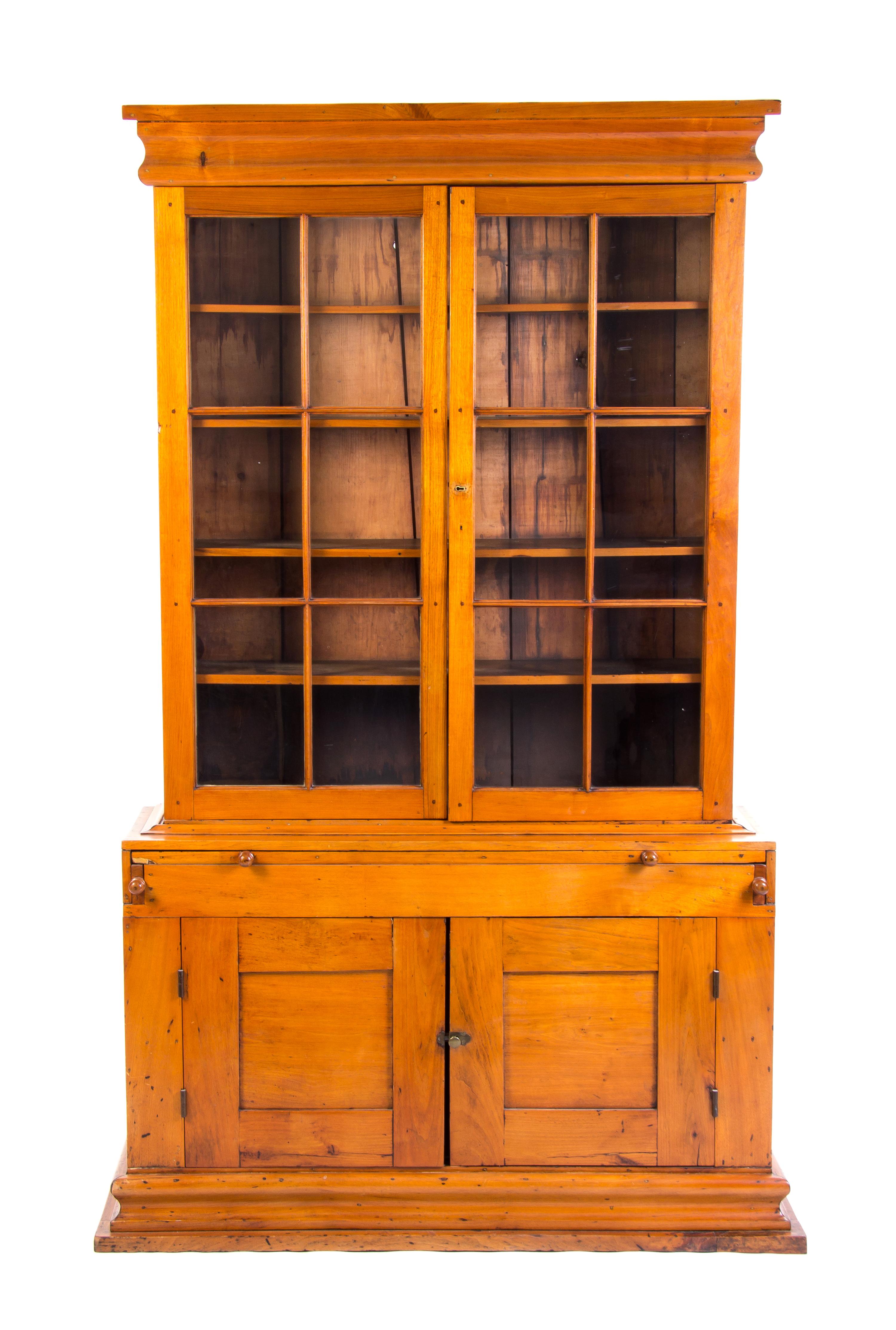 An American Cherry Secretary Bookcase, LATE 18TH CENTURY, Height 83 x width 52 x depth 18 inches. — LATE 18TH CENTURY,