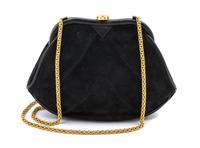 A Chanel Black Chevron Quilted Suede Convertible Bag, 9 x 5 1/2 x 1 inches.