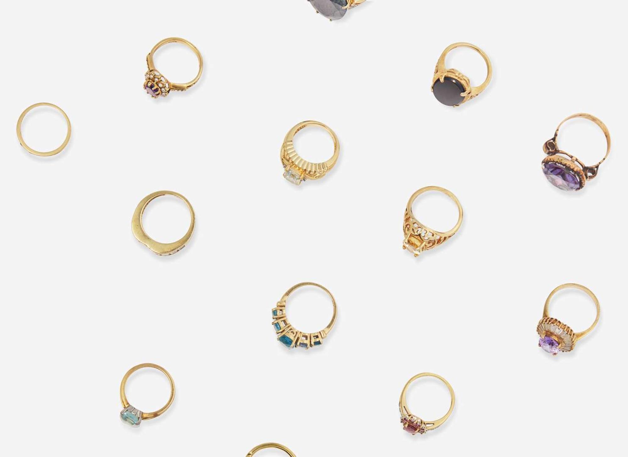 A Collection of Assorted Gold and Gemstone Rings