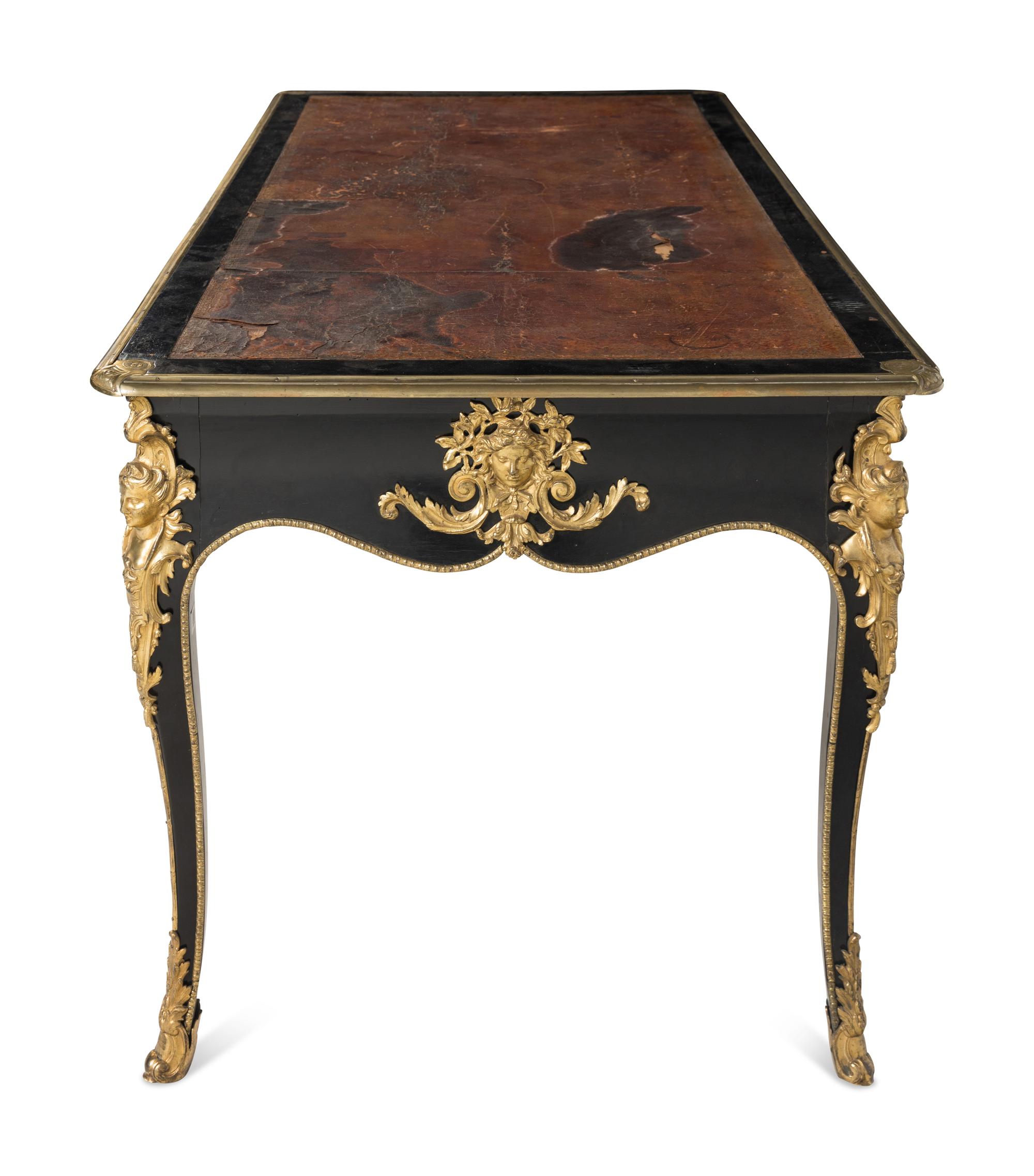 A Louis XV Style Gilt Bronze Mounted Ebonized Bureau Plat