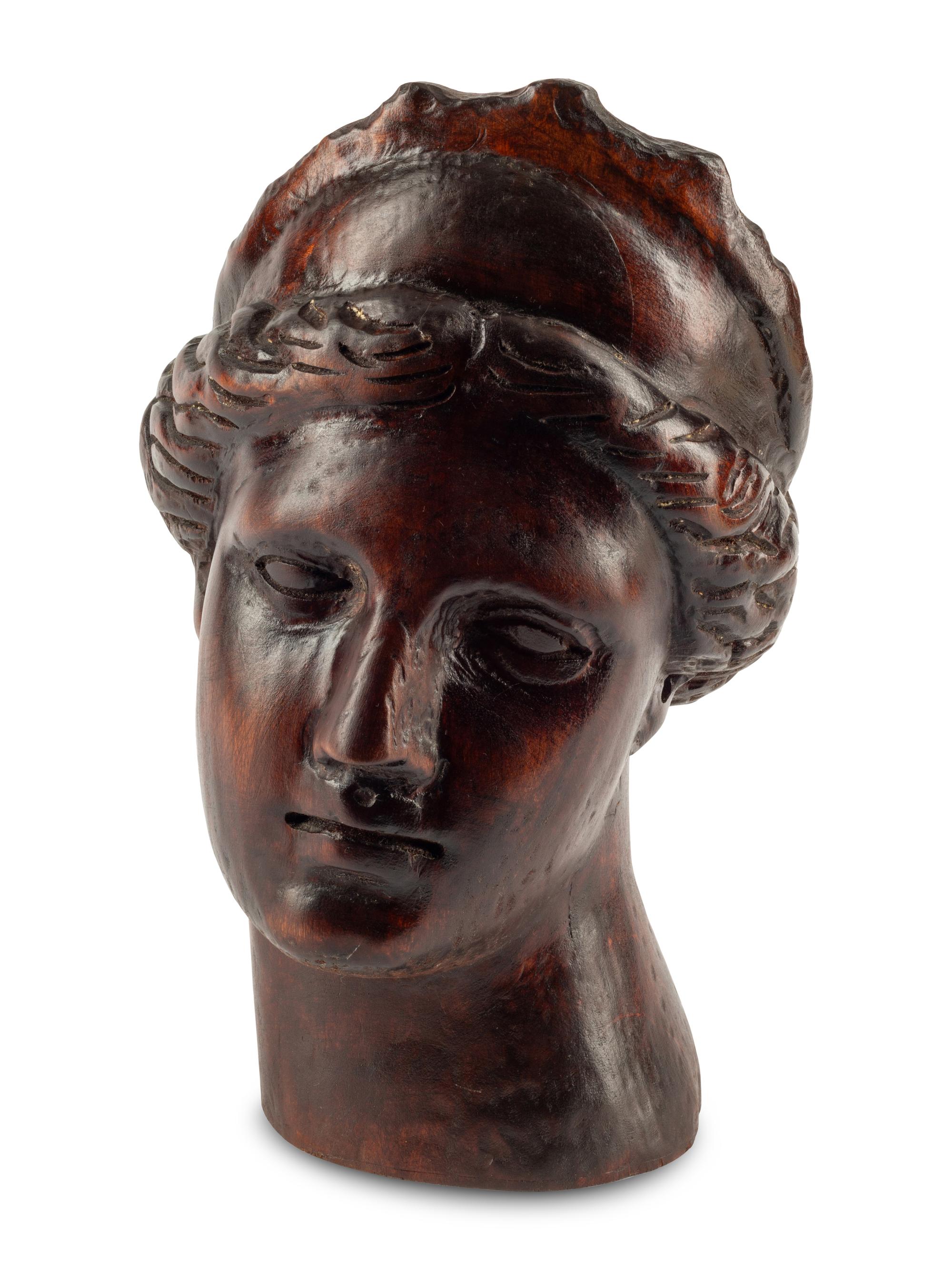 A Continental Carved Wood Head of Aphrodite