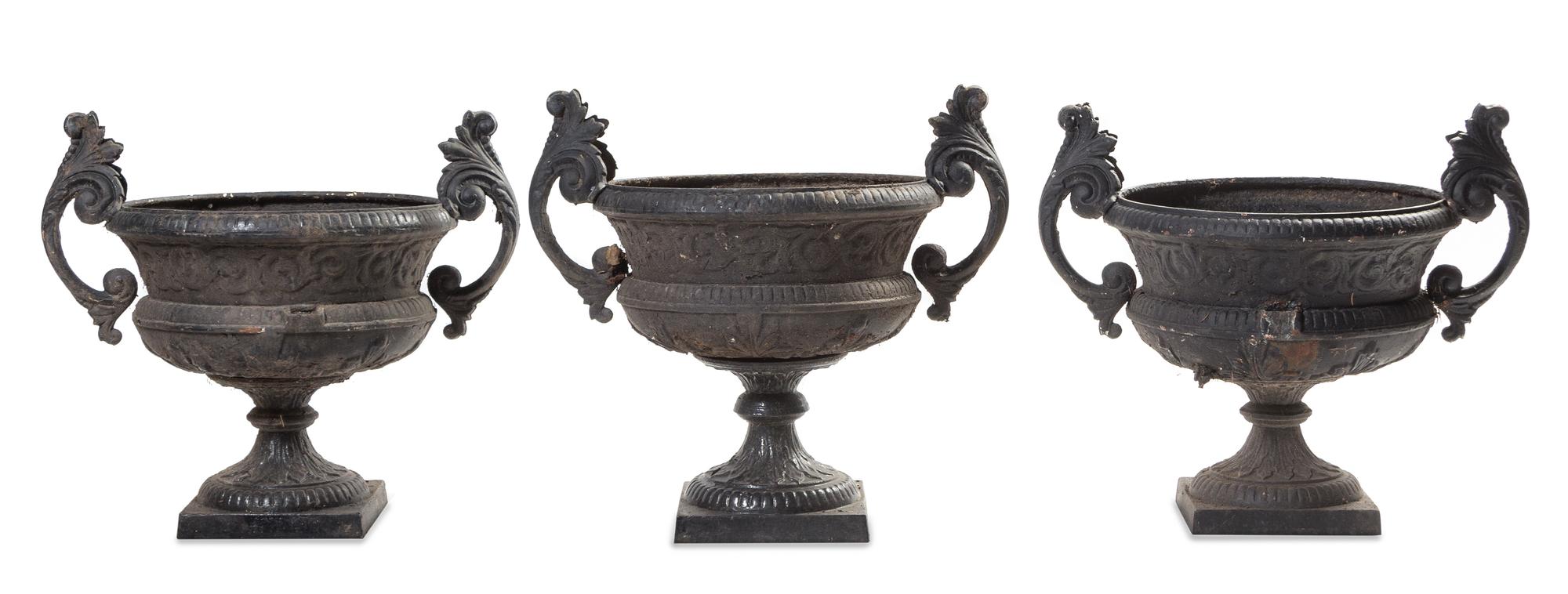 A Set of Five Victorian Painted Iron Jardinieres Width 28 1/2 inches.