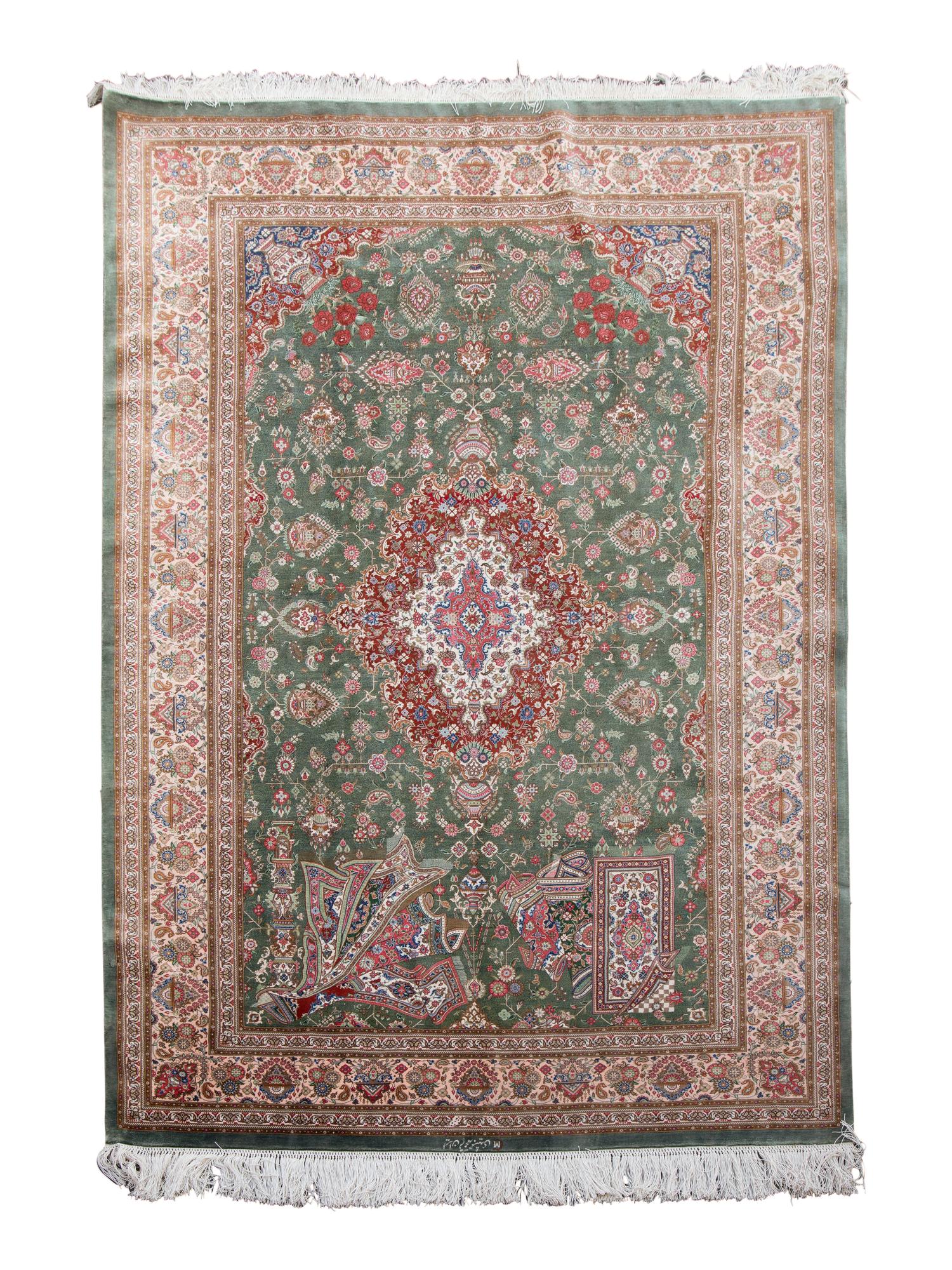 A Tabriz Silk and Wool Rug