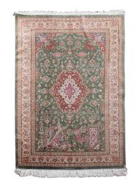 A Tabriz Silk and Wool Rug
