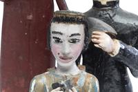 Seven Folk Art Carved and Painted Wood Figures