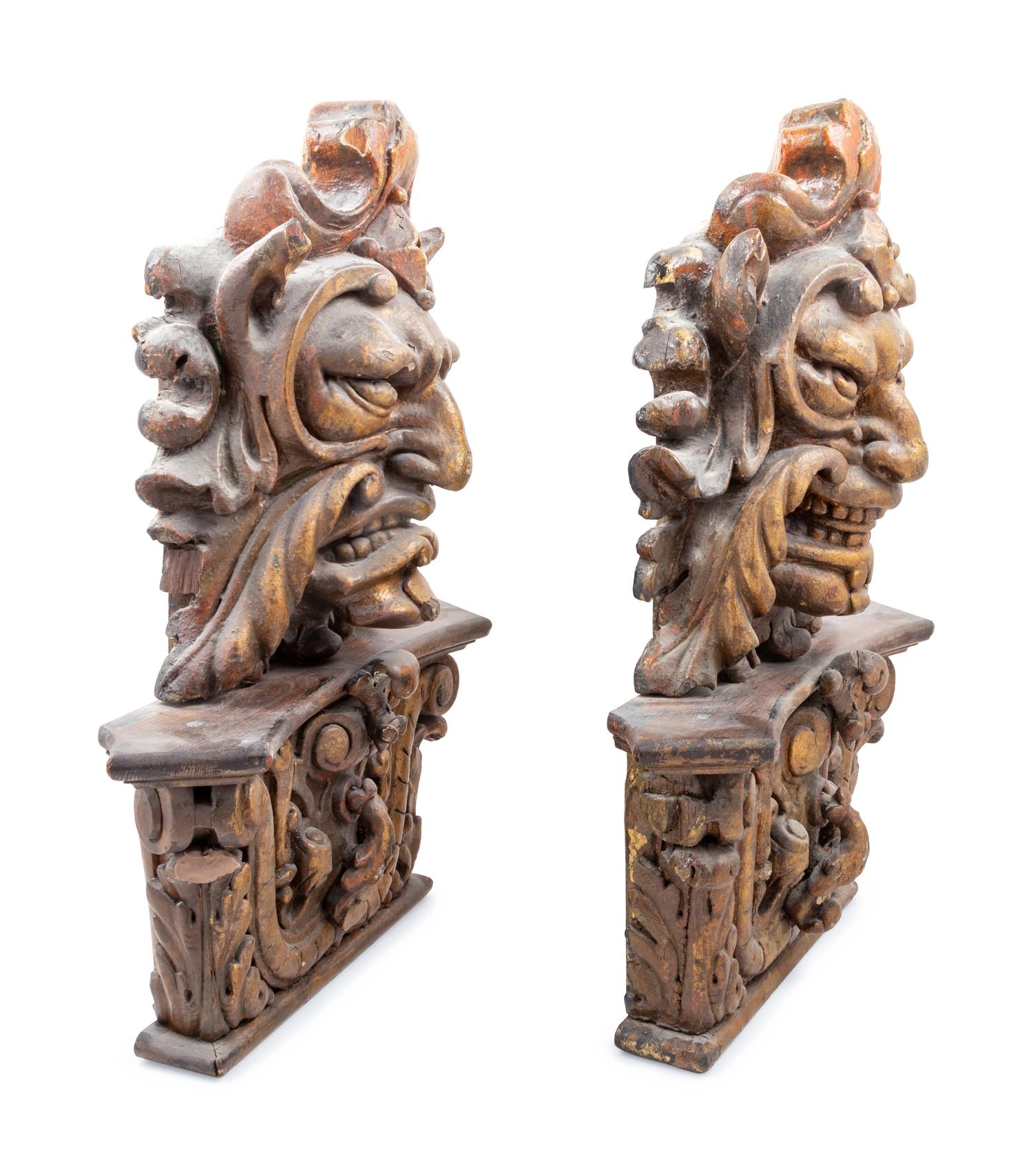 A Pair of Italian Painted and Parcel Gilt Masks