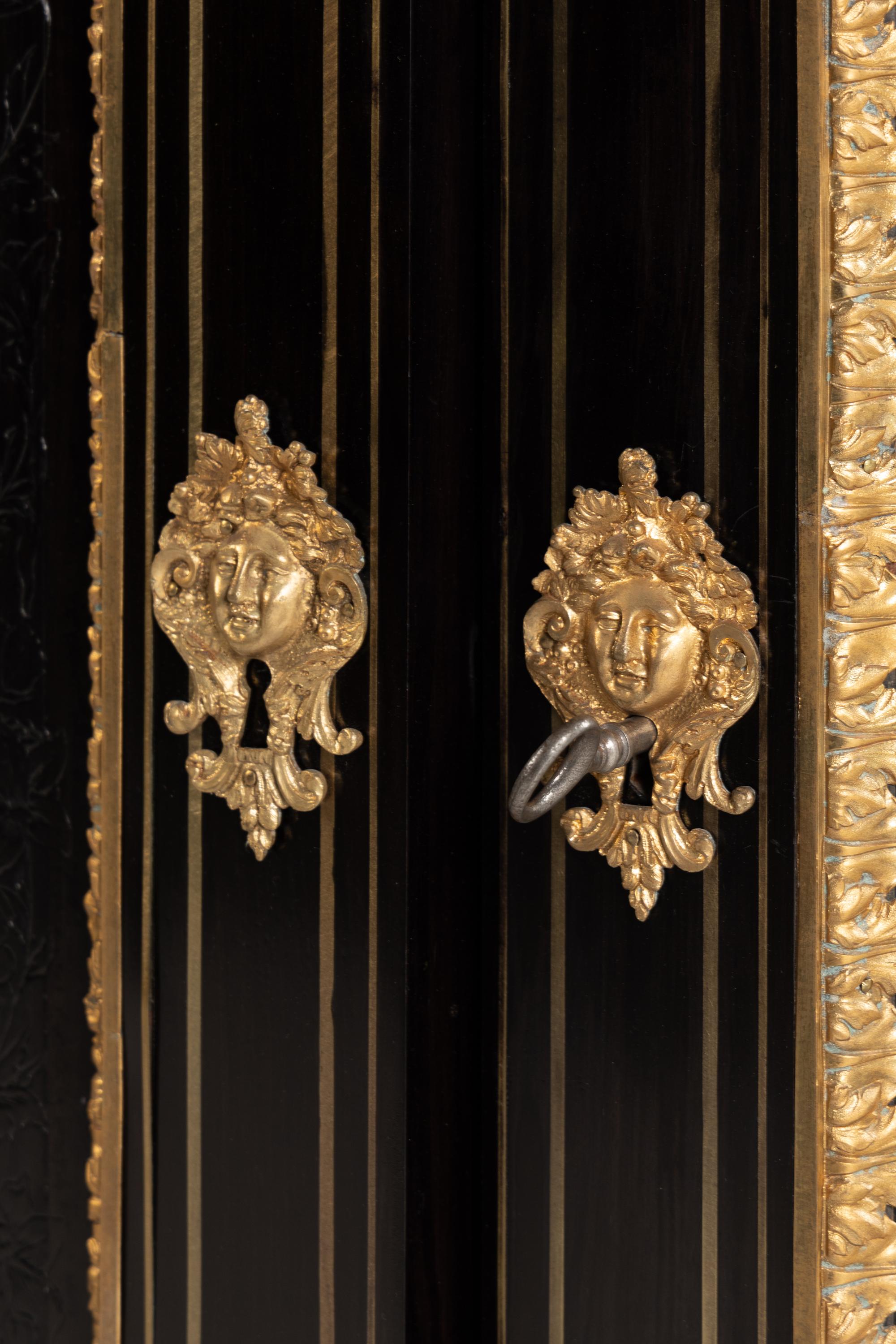 A Napoleon III Bas Relief-Carved, Gilt Bronze Mounted and Pietra Dura-Inset Marble-Top Cabinet